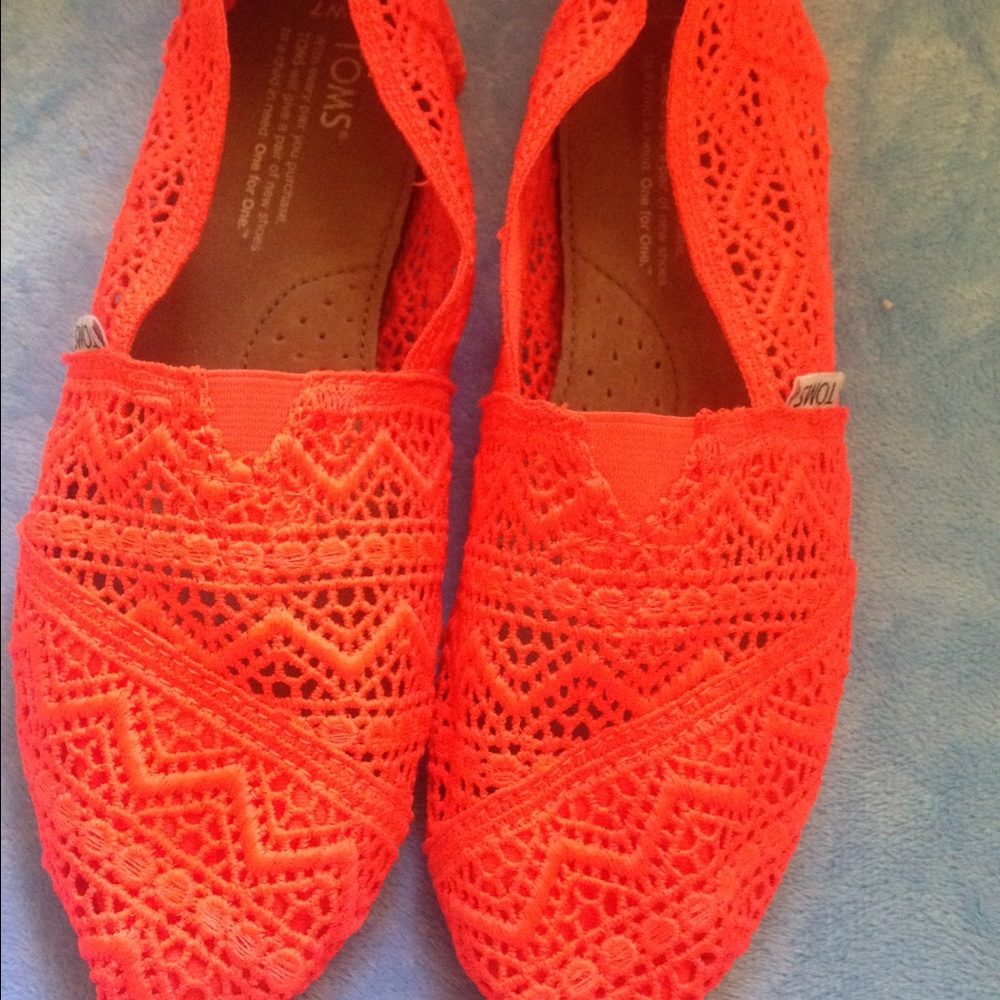 Orange toms size 7